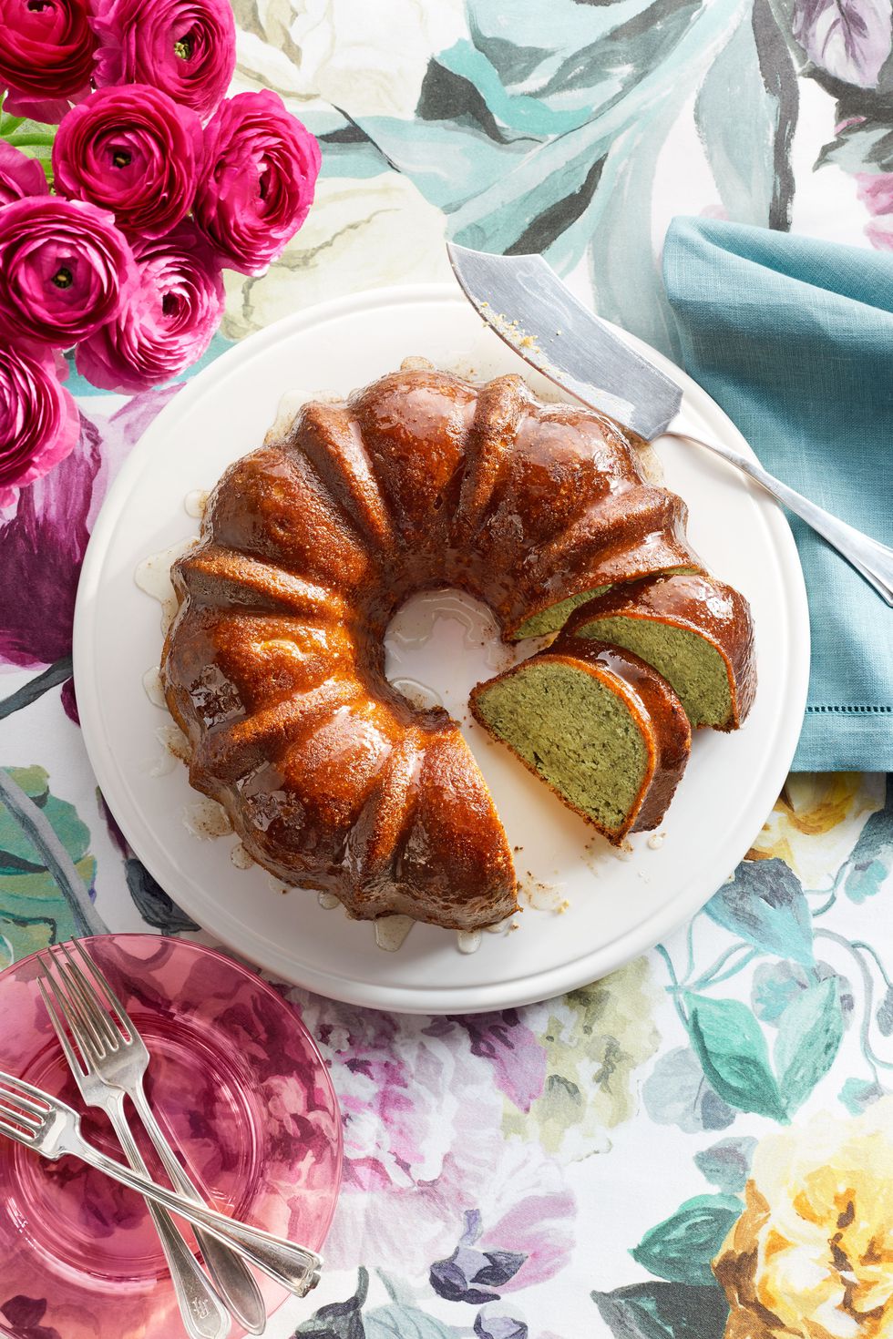 Lemon bundt cake with a few slices cut
