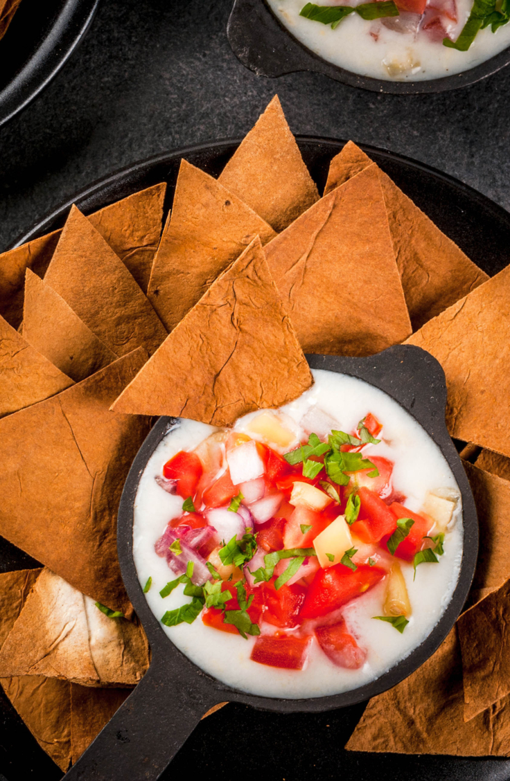 This nacho cheese sauce recipe will knock your socks off and leave your guests impressed! Easy to do, and tastes great! Everyone loves a good Queso Blanco dip, right? 