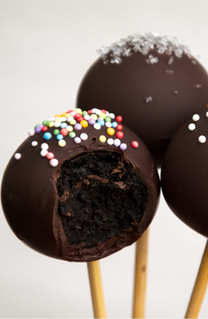 Do you love to bake? Do you like to be creative with your baking? If the answer is yes, you NEED a cake pop maker! It's a fun spin on traditional baking! These chocolate cake pops are to die for!