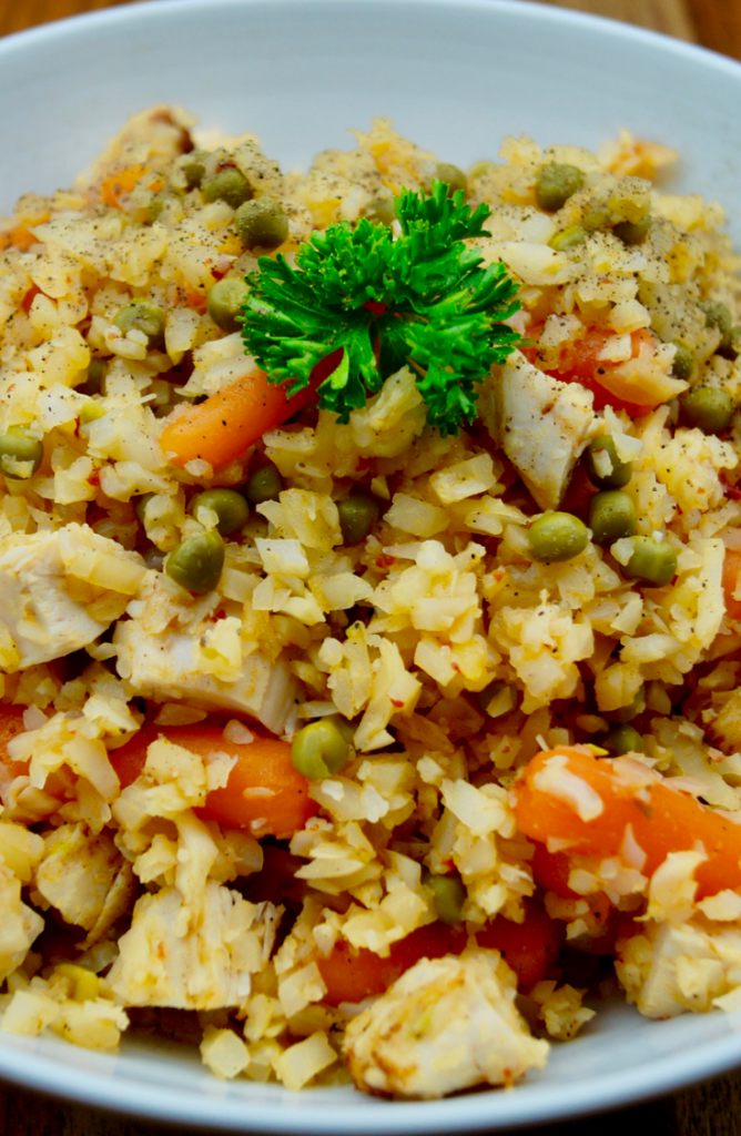 If you haven't used riced cauliflower when cooking, then you're missing out! Check out these delicious riced cauliflower recipes! This chicken cauliflower fried rice is amazing! 
